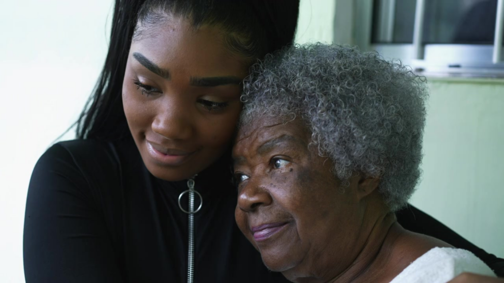 A young woman gently hugs a older woman caringly.

Caring Gift of Hope